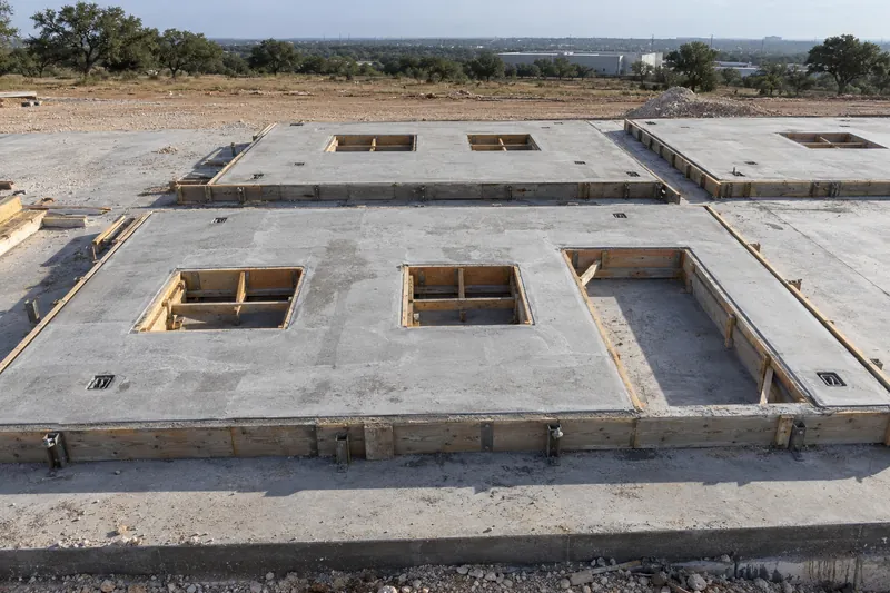 Tilt-wall panels cast flat on a slab with door openings