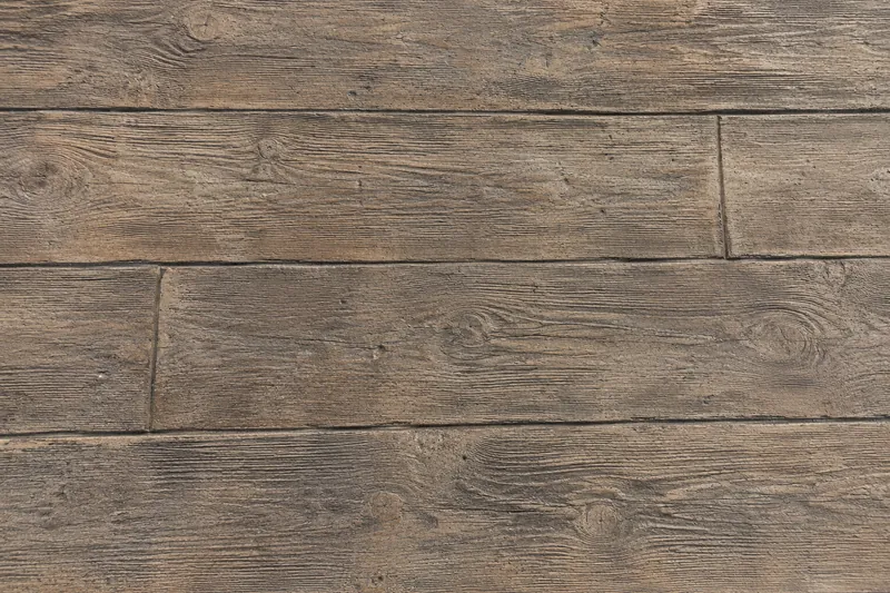 Stamped concrete textured like weathered wood planks
